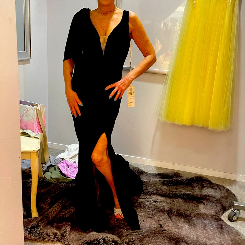Black formal dress with rhinestone back buttons